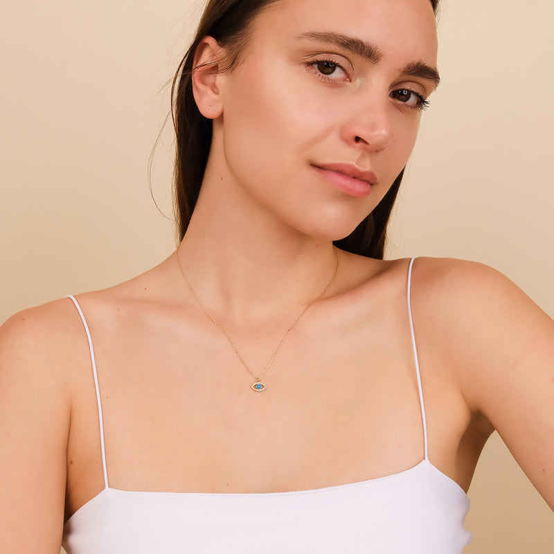 Gold evil eye necklace with turquoise and diamonds