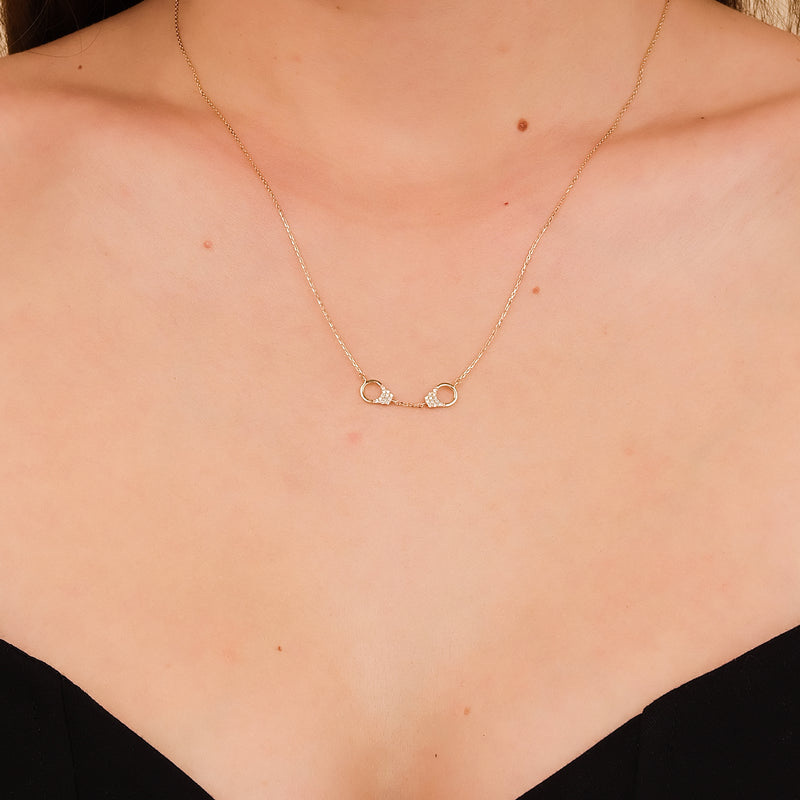 Diamond handcuff necklace in solid gold