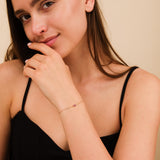 14k or 18k gold red stone