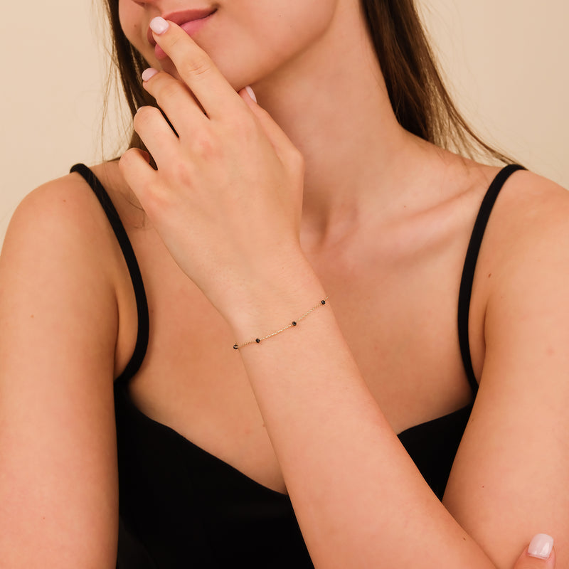 handmade solid gold thin black diamond station bracelet