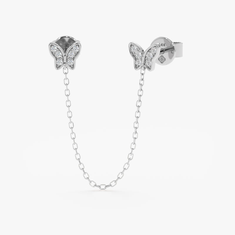 handcrafted pair of solid 14k white gold butterfly stud earrings with diamonds and hanging chain for her