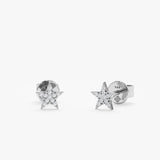 handcrafted pair of solid 14k gold stud earrings with paved diamonds