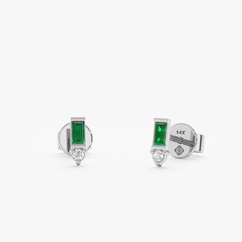 handcrafted pair of solid white gold baguette emerald stud earrings with diamond