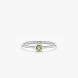 white gold thin green gemstone band