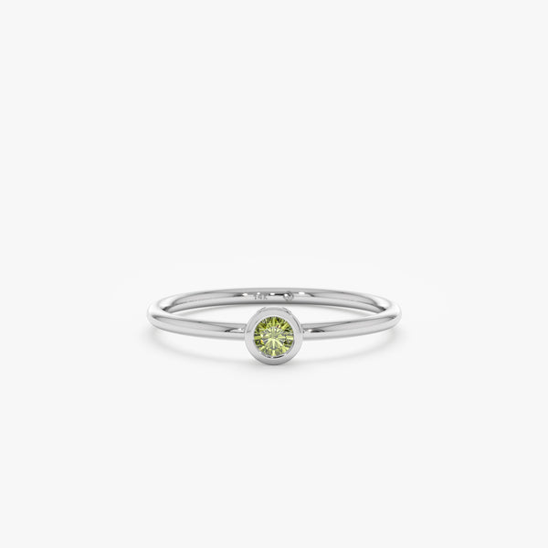 white gold thin green gemstone band