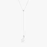 Diamond snake necklace, gold lariat, luxury jewelry.