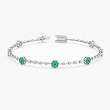 white gold emerald station bracelet