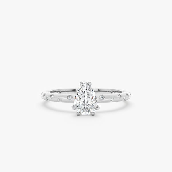 drop shape white diamond in brushed white gold band