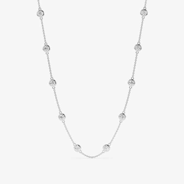 handcrafted white gold diamond bezel station necklace