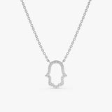 solid white gold necklace with hamsa hand pendant with lined diamonds