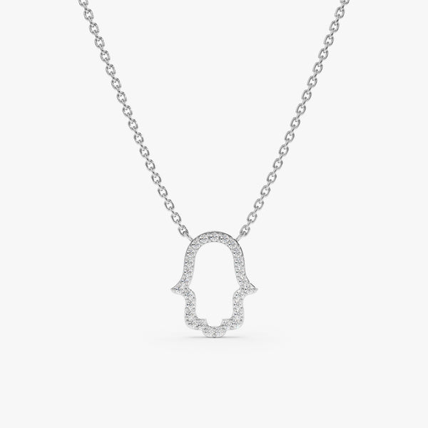 solid white gold necklace with hamsa hand pendant with lined diamonds