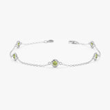 white gold bracelet with natural green peridot