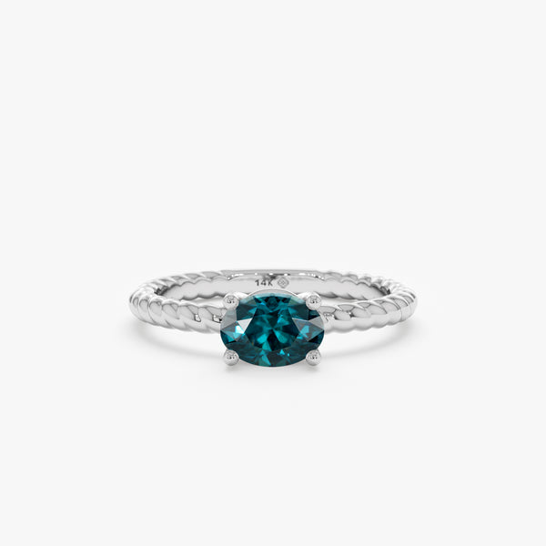 solid white gold twisted ring with oval teal blue sapphire 