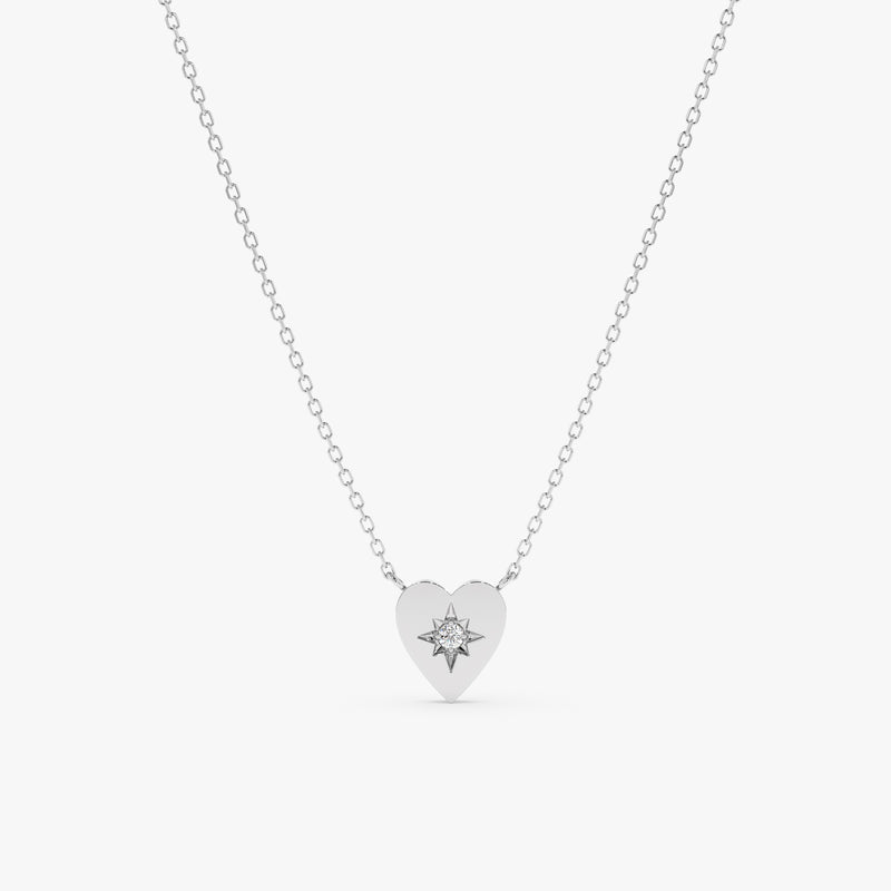 handcrafted 14k white gold necklace with starburst heart pendant and single white diamond