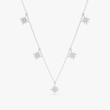 handcrafted solid white gold necklace with multiple hanging north star diamond charms