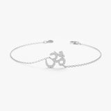Diamond OM symbol bracelet on a white gold chain
