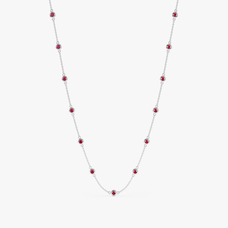 Elegant ruby necklace strung along a white gold chain.