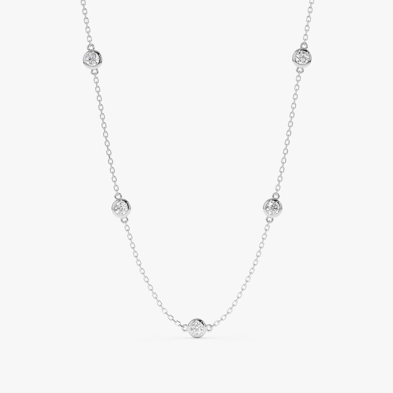 solid white gold diamond by the yard necklace with five bezel diamonds