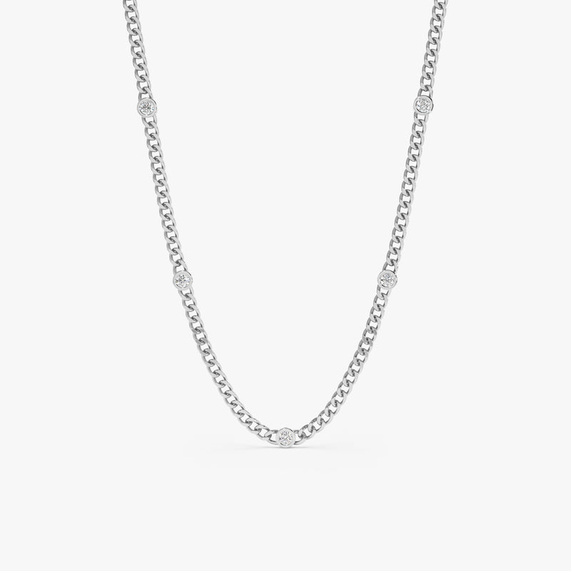 handcrafted 14k white gold cuban chain necklace with multiple diamond bezels