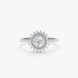 white gold and white diamond starburst engagement ring