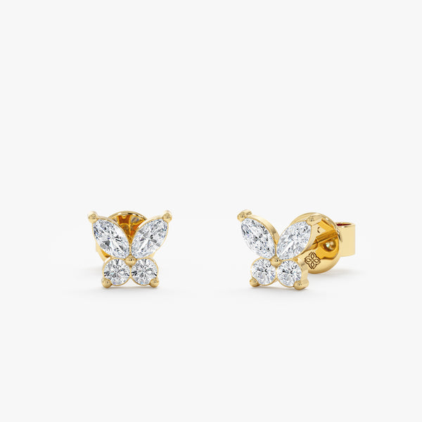 handmade pair of solid 14k yellow gold petite butterfly diamond stud earrings