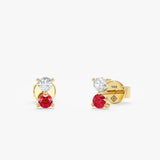 Handmade pair of solid 14k gold stud earrings with single ruby and single diamond 