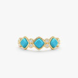 Cymbria Discover effortless sophistication with our Natural Turquoise & Lab Grown Diamond Ring. Crafted in lustrous solid gold, this exquisite band features a captivating arrangement of vibrant square natural turquoise cabochons, each meticulously bezel-s