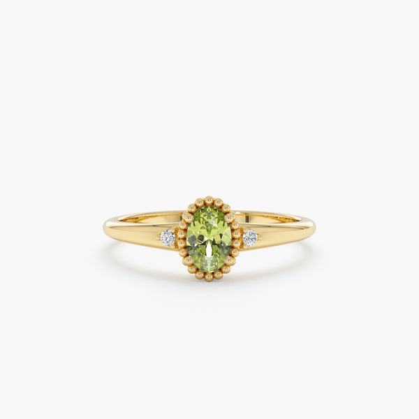 oval cut peridot engagement ring with diamond accents