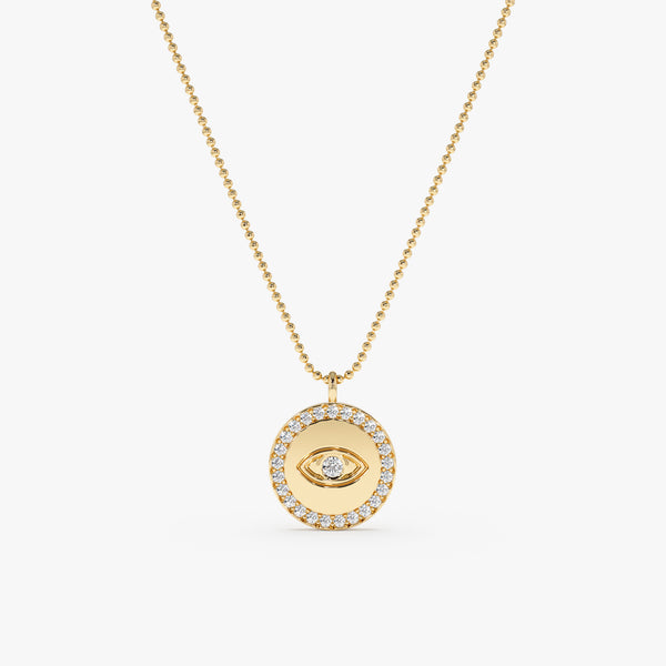 handcrafted solid gold eye medallion with natural diamonds and ball chain