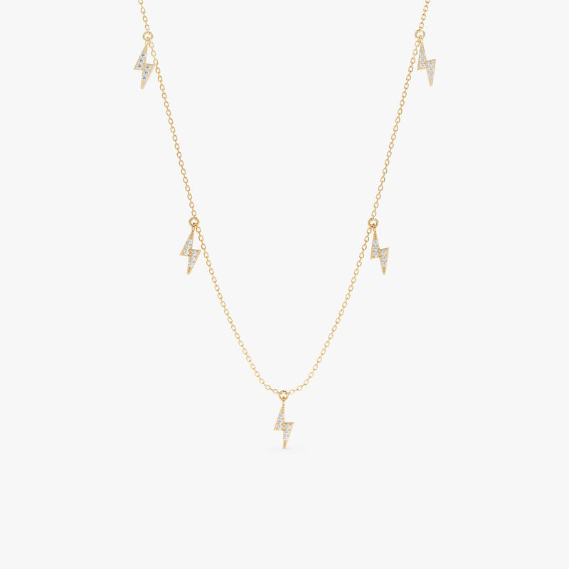 handmade solid gold hanging lightning bolt charms with paved diamonds