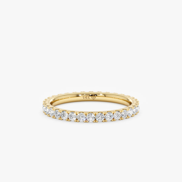 yellow gold prong set diamond band