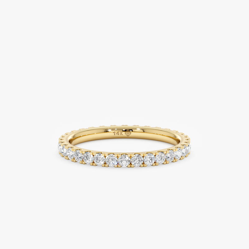 yellow gold prong set diamond band