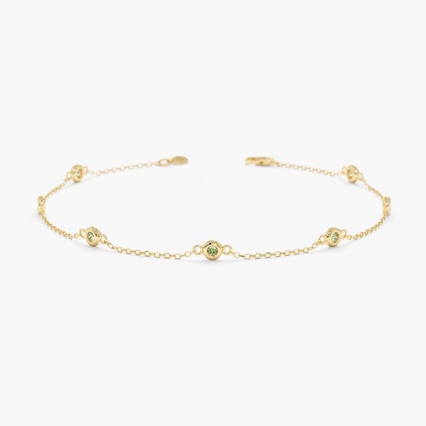 yellow gold peridot station bracelet