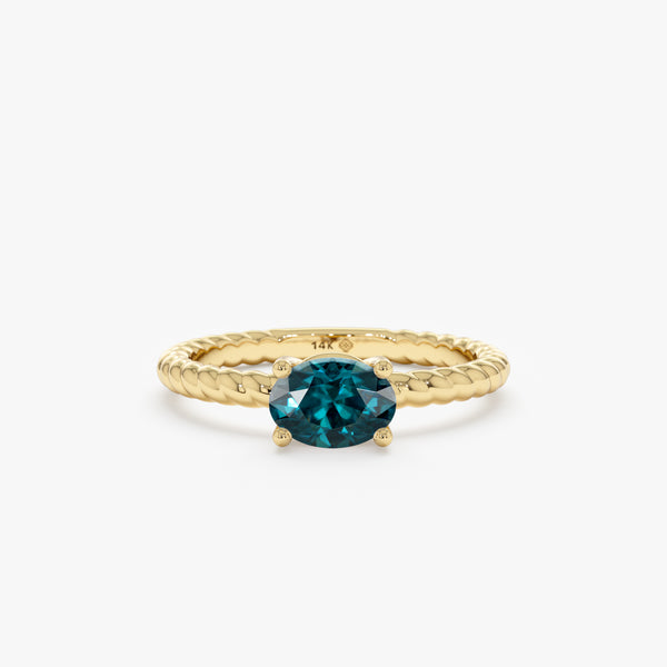 oval cut blue teal sapphire ring in solid gold