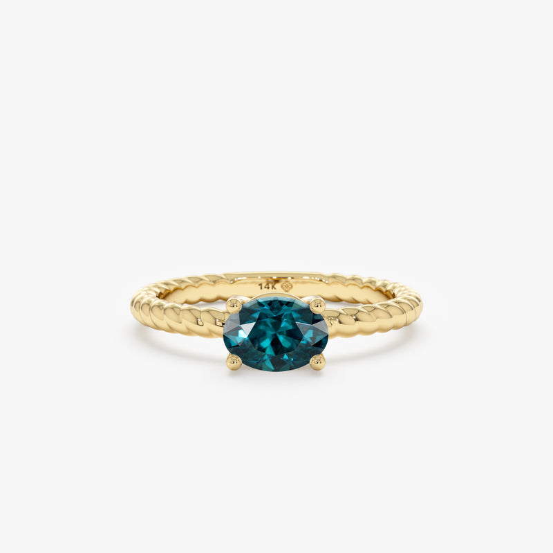 oval cut blue teal sapphire ring in solid gold