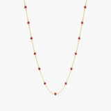 Ruby station necklace crafted in solid gold.