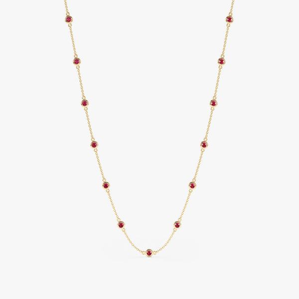 Ruby station necklace crafted in solid gold.
