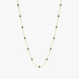 Emerald station necklace in gold