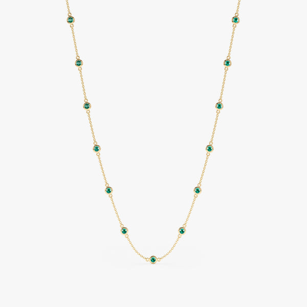 Emerald station necklace in gold