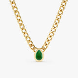 solid yellow gold miami cuban chain with natural pear-cut emerald