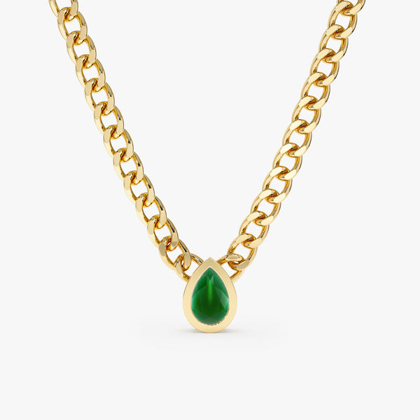solid yellow gold miami cuban chain with natural pear-cut emerald