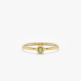 yellow gold peridot bezel ring