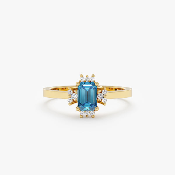 radiant cut blue zircon ring with surrounding white diamonds