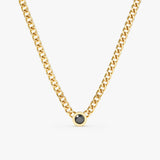 yellow gold cuban chain necklace with single bezel black diamond