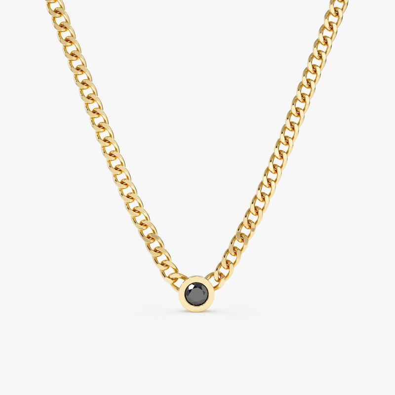 yellow gold cuban chain necklace with single bezel black diamond