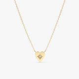 handmade solid gold necklace with starburst heart pendant with single diamond 