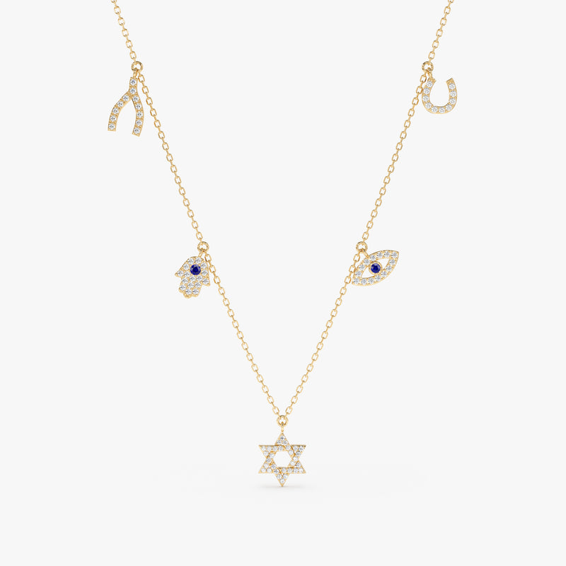 solid gold necklace with horseshoe charm, wishbone, hamsa hand, eye and star of david protective charms in lined diamonds with blue sapphire