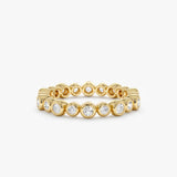 yellow gold diamond eternity band