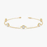 Diamond by the yard bracelet in gold.