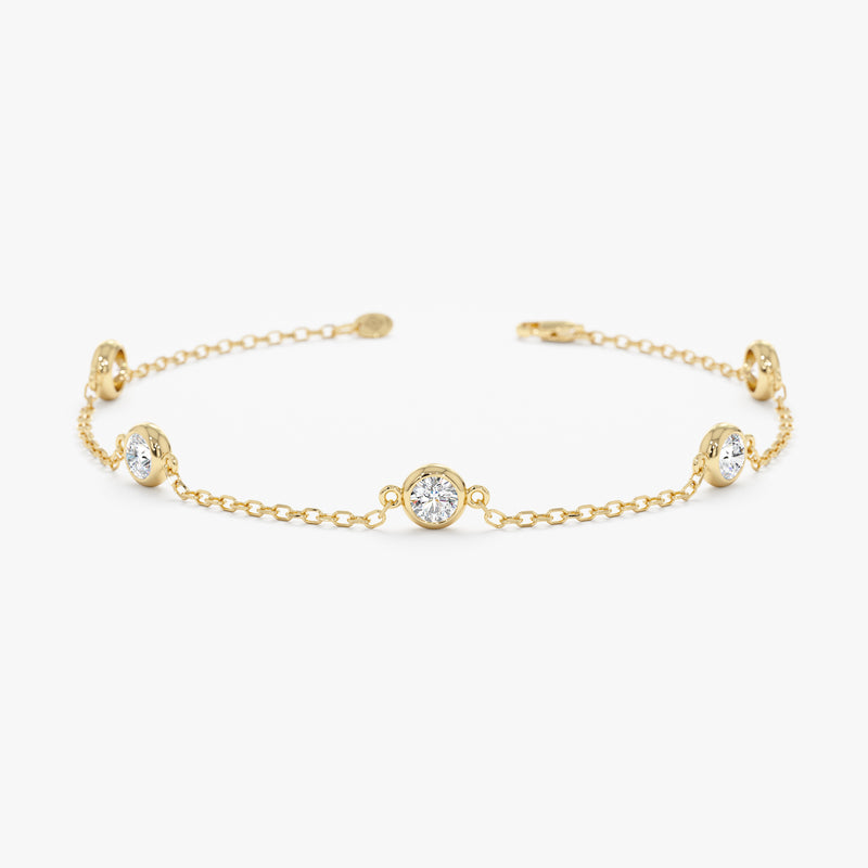 Diamond by the yard bracelet in gold.